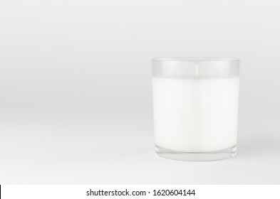 White Candle In Transparent Glass On White Background, Mock Up For Branding Identity Product, Advertising, Presentation, Design Of Packing.