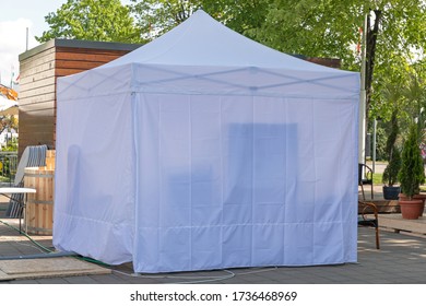 White Canopy Gazebo Tent At Garden Patio