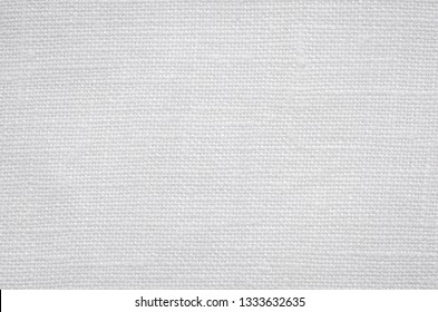 White canvas background. White linen texture. Cotton fabric with fibers, close-up. - Shutterstock ID 1333632635