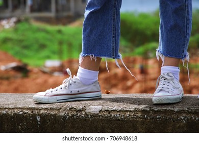 blue and white canvas shoes