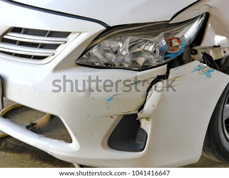 white car accidented ,car damaged 