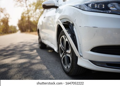 white car has a small bump crash, due to a slight with front-end collision,waiting for insurance contact. - Shutterstock ID 1647052222