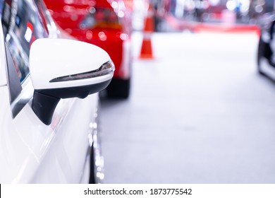 White Car Mirror In The Luxury Car Show Room.