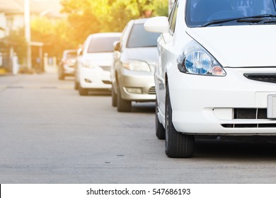 White Car Parked In A Row On The Road, Outdoor Parking