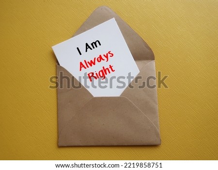 White card in envelope on yellow background I AM ALWAYS RIGHT, means one who so keen to be always right, hard to accept feelings or viewpoint of others