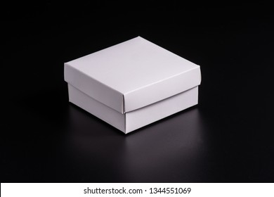 White Cardboard Box On Black Background, Moke Up