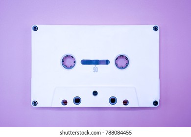 White Cassette Tape On Ultra Violet Purple Background