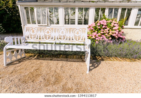 White Cast Iron Garden Bench Beside Stock Photo Edit Now 1394113817