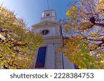 White catholic church at the old town of Olten, Canton Solothurn, in bright sunlight on a sunny autumn day. Photo taken November 10th, 2022, Olten, Switzerland.