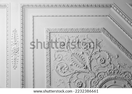 White ceiling design elements in rococo style, bas-relief details. Classic architecture abstract template