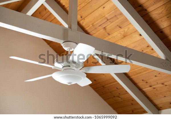 White Ceiling Fan On Exposed Support Stock Photo Edit Now 1065999092