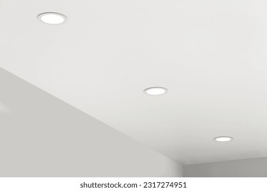 White ceiling with modern lighting in room - Powered by Shutterstock