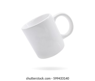 White Ceramic Handle Mug On Isolated Background With Clipping Path. Blank Drink Cup For Your Design.