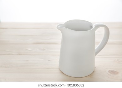 White Ceramic Pitcher