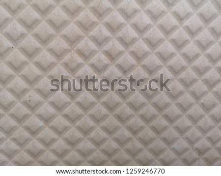 White ceramic tiles with patterns.