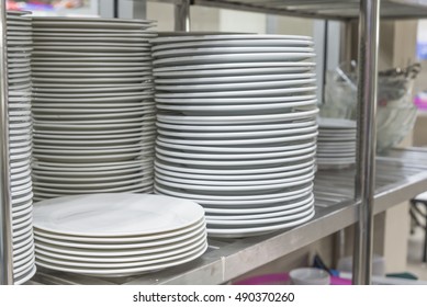 white ceramics plate and empty white bowl 