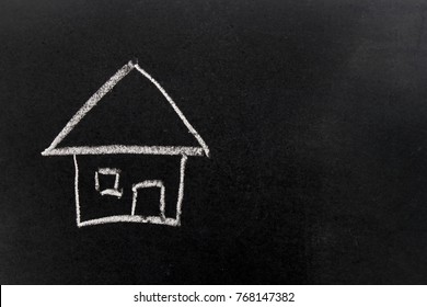 White chalk drawing as house shape on black board background (Concept of dream home, happy family) - Powered by Shutterstock