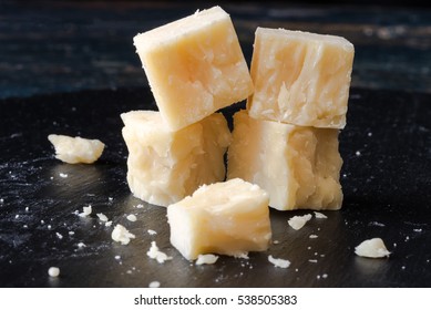 White Cheddar Cheese Cubes on a Black Slate - Shutterstock ID 538505383