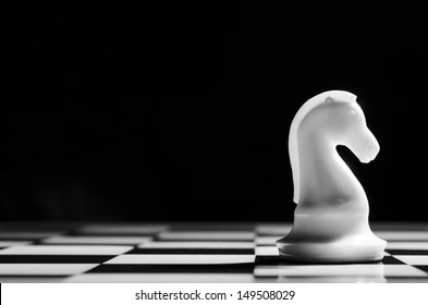 White Chess Knight On Background