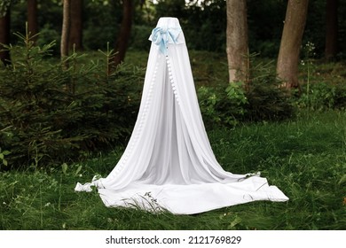 White Children's Wigwam,tent With A Blanket In A Green Summer Sunny Garden.