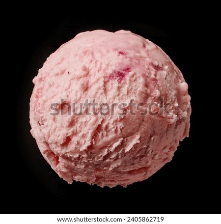 white chocolat and cherry ice cream scoop isolated on black background, top view