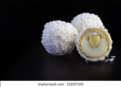 White Chocolate And Coconut Truffles On Black Background