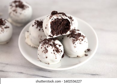 White Chocolate Covered Chocolate Sandwich Cookie Truffles