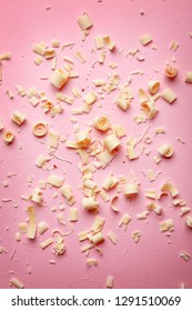 White Chocolate Curls On Color Background, Top View