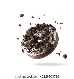White chocolate glazed donut with dark cookies crumbs and creme filled closeup flying. Sweet doughnut falling isolated on white background - Shutterstock ID 2129803736