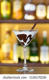 White Chocolate Martini Garnish With A Black Chocolate Stick