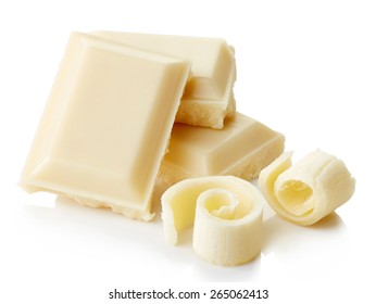 White chocolate pieces and curls isolated on white background