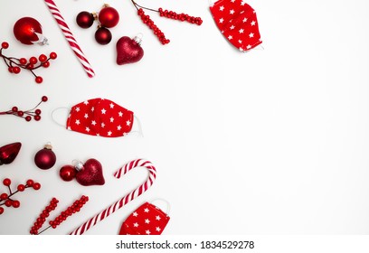 White Christmas background banner with face masks, candy cane and christmas ornaments on white background - Powered by Shutterstock