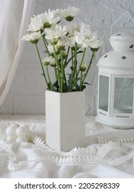 White Chrysanthemum In A White Vase