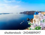 white church belfry and volcano caldera with sea landscape, beautiful details of Santorini island, Greece