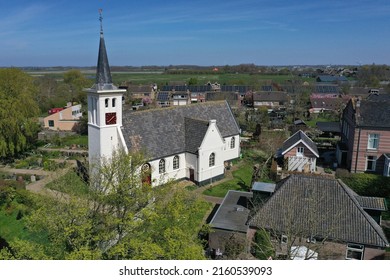 White church in the northern Dutch village of Hauwert in the Netherlands. Photo taken with a drone.