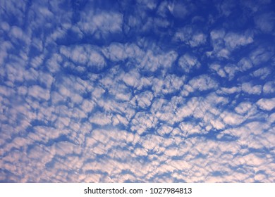 white cirrocumulus cloud blue sky background