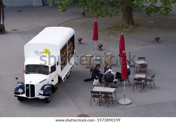 White classic car truck used as wine pop up\
store at City of Zurich, Switzerland. Photo taken May 14th, 2021,\
Zurich, Switzerland.