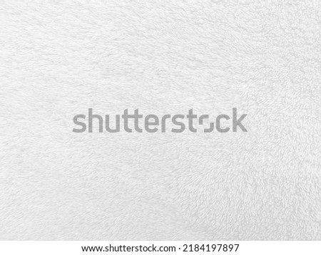 White clean wool texture background. light natural sheep wool. white seamless cotton. texture of fluffy fur for designers. close-up fragment white wool carpet.