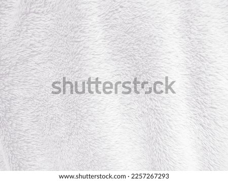 White clean wool texture background. light natural sheep wool. white seamless cotton. texture of fluffy fur for designers. close-up fragment white wool carpet.	