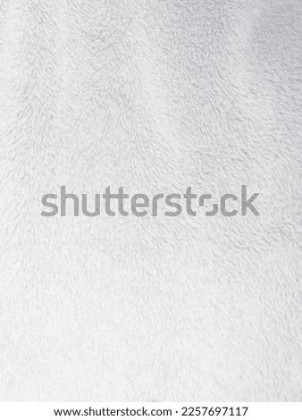 White clean wool texture background. light natural sheep wool. white seamless cotton. texture of fluffy fur for designers. close-up fragment white wool carpet.	