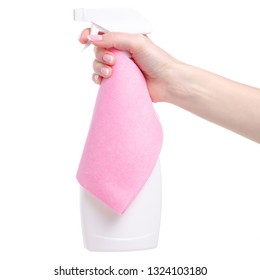 White cleaning spray with pink rag in hand on white background isolation