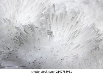 White and clear natural gem stone texture. Abstract cristal background with 
translucent cristals.