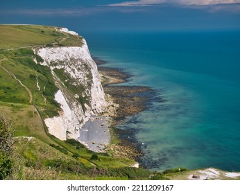 The White Cliffs Of Dover In Kent, UK. Taken On A Calm Day In Summer, With A Clear, Turquoise Sea.