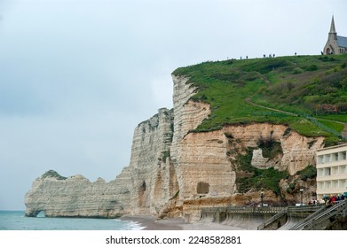 white cliffs and natural arches at Etretat in French Normandy  - Shutterstock ID 2248582881