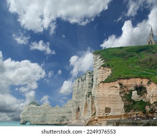 white cliffs and natural arches at Etretat in French Normandy - Shutterstock ID 2249376553