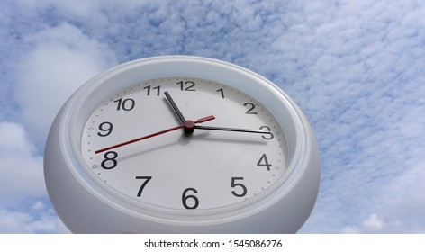 White clock beginning of time 11.16 am or pm.on sky clouds nature background, Copy space for your text, Time concept. - Powered by Shutterstock