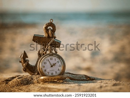 A white clock with a circular face and hands is perched atop a sandy beach, illuminated by a bright sun