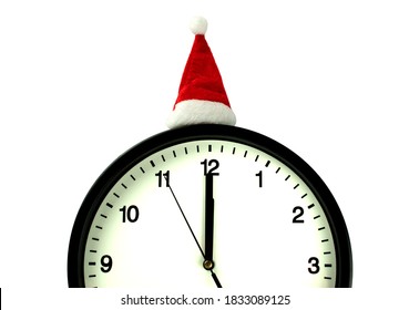 The white clock in red sunta hat shows five seconds to midnight, on the whit background. Countdown to the new year - Powered by Shutterstock