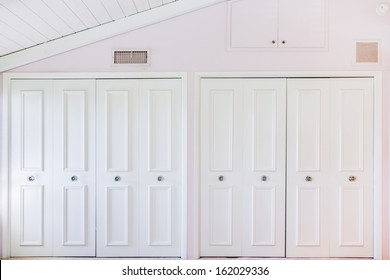 White Closet Door In Pink Room