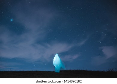 White cloth with flashlight inside
